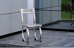 SEDIA CON GAMBE TONDE  IN ACCIAIO INOX